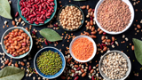 A view from above of dried beans and lentils in bowls