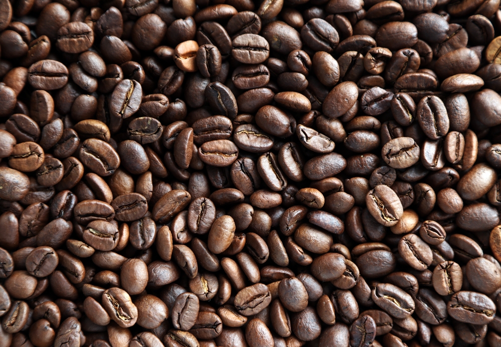 An image showing a close up of roasted coffee beans.